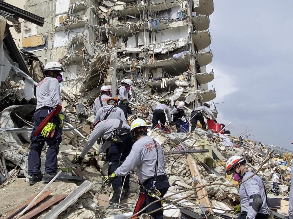 Hallan cuerpos de venezolanos edificio en Miami - ACN
